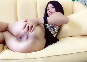 Asian Cute Explicit showcases off the brush shaved pussy increased by pees like a fountain