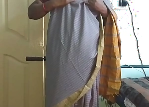 Desi indian tamil telugu kannada malayalam hindi horny cheating wife vanitha wearing grey colour saree showing big boobs and shaved pussy press hard boobs press chew rubbing pussy masturbation