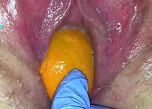Tight pussy milf gets her pussy destroyed with a orange and big apple popping it parts of her tight hole making her squirt